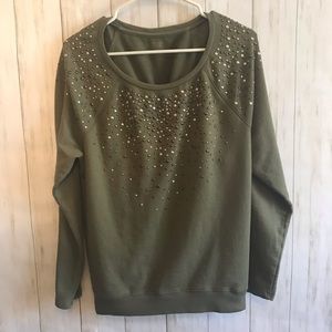 Crew neck sweater with metal embellishments